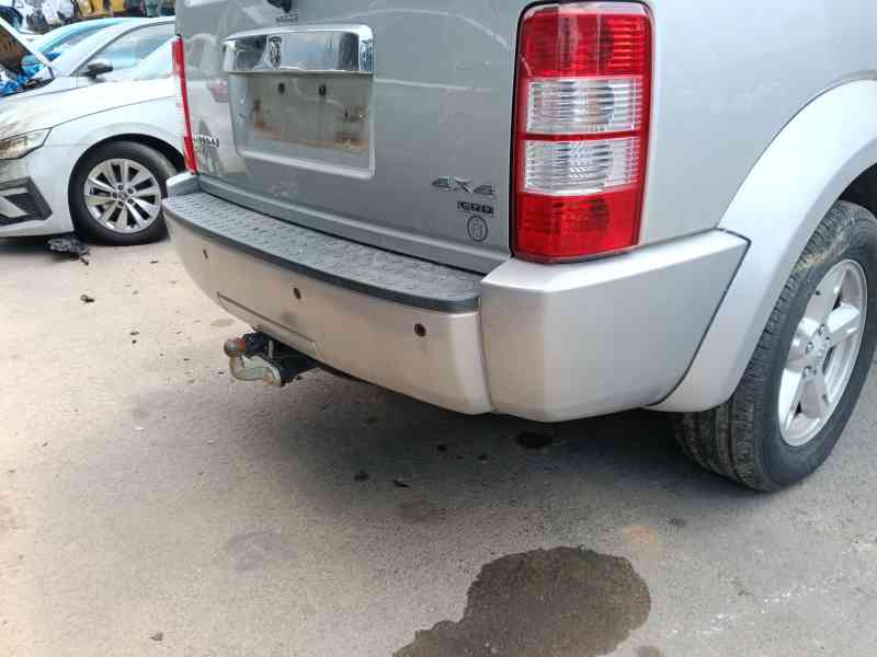 Recambio de paragolpes trasero para dodge nitro 2.8 crd 4wd referencia OEM IAM   