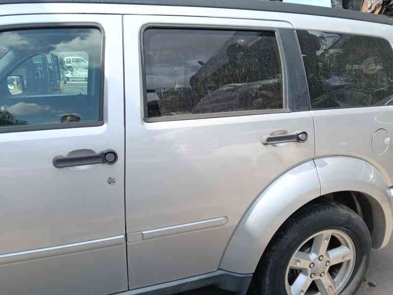 Recambio de puerta trasera izquierda para dodge nitro 2.8 crd 4wd referencia OEM IAM   