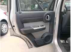 Recambio de guarnecido puerta trasera izquierda para dodge nitro 2.8 crd 4wd referencia OEM IAM   