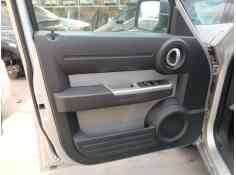 Recambio de guarnecido puerta delantera izquierda para dodge nitro 2.8 crd 4wd referencia OEM IAM   