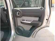 Recambio de guarnecido puerta trasera derecha para dodge nitro 2.8 crd 4wd referencia OEM IAM   