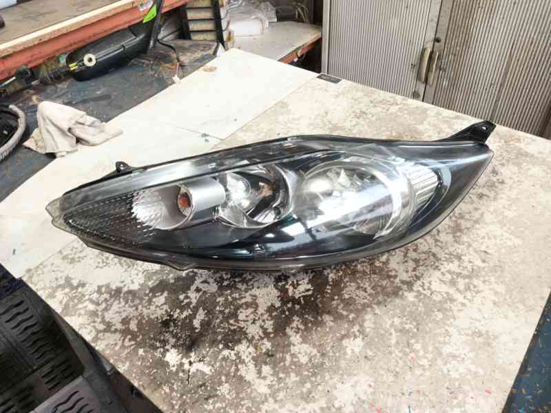 Recambio de faro izquierdo para ford fiesta vi (cb1, ccn) 1.25 referencia OEM IAM 1734615  