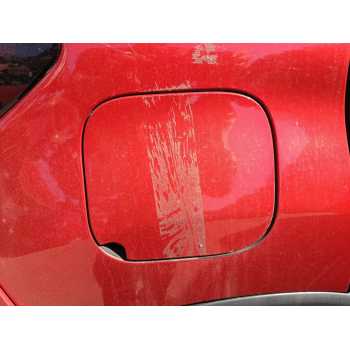 TAPA EXTERIOR COMBUSTIBLE 