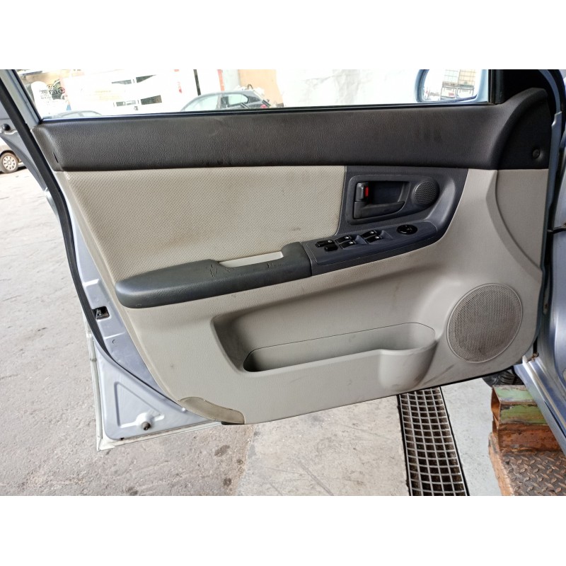 Recambio de guarnecido puerta delantera izquierda para kia cerato 2.0 turbodiesel cat referencia OEM IAM   