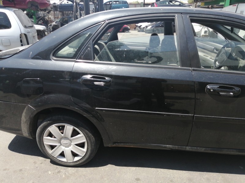 Recambio de puerta trasera derecha para chevrolet nubira berlina sx referencia OEM IAM COMPLETA  