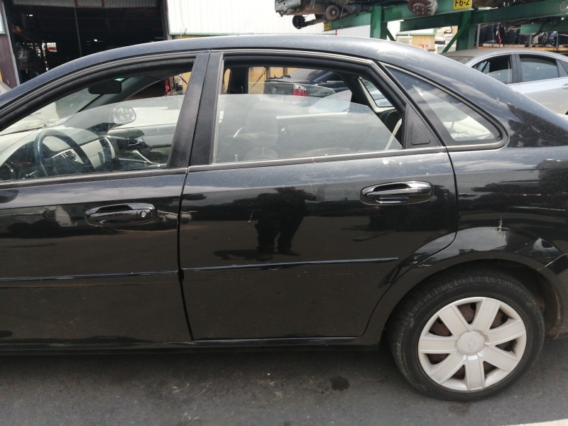 Recambio de puerta trasera izquierda para chevrolet nubira berlina sx referencia OEM IAM COMPLETA  