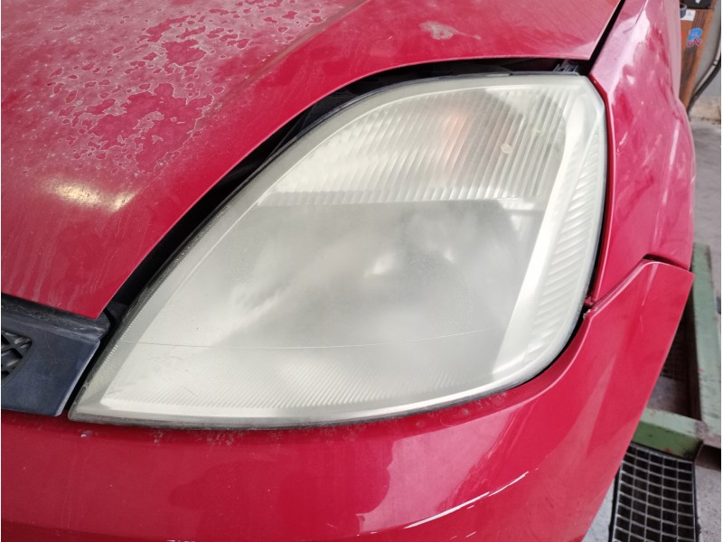 Recambio de faro izquierdo para ford fiesta (cbk) ambiente referencia OEM IAM   PARA PULIR