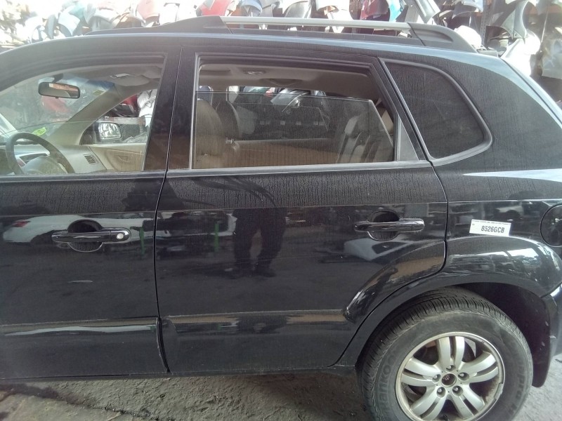 Recambio de puerta trasera izquierda para hyundai tucson (jm) 2.0 crdi premium 4x4 referencia OEM IAM COMPLETA  