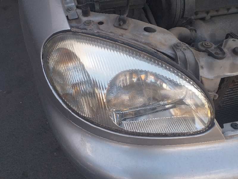 Recambio de faro derecho para daewoo lanos sx referencia OEM IAM 0301000784  