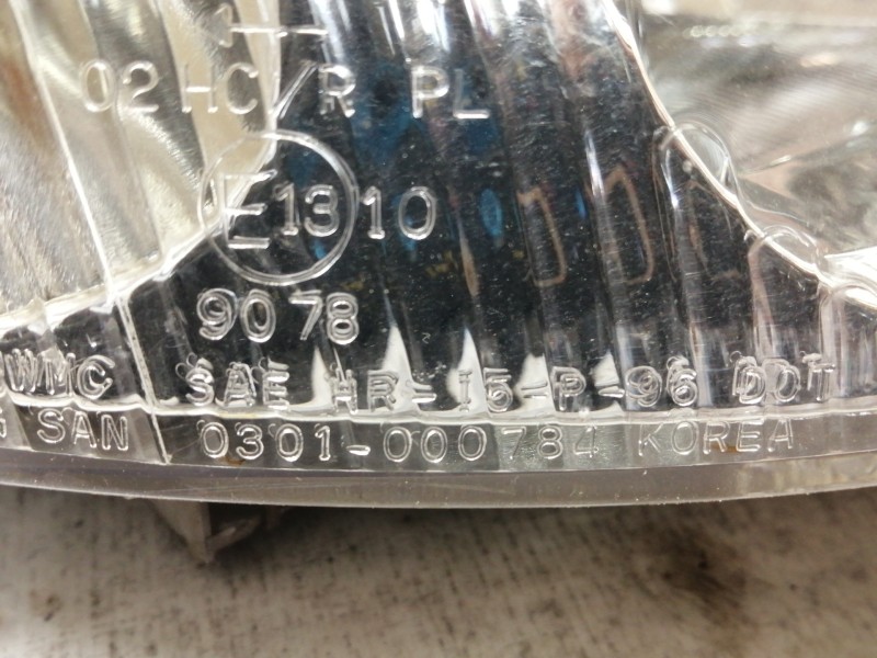 Recambio de faro derecho para daewoo lanos sx referencia OEM IAM 0301000784  