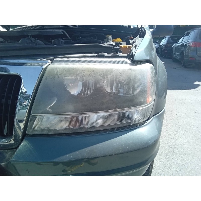 Recambio de faro izquierdo para jeep gr.cherokee (wj/wg) 2.7 crd laredo referencia OEM IAM 30987  