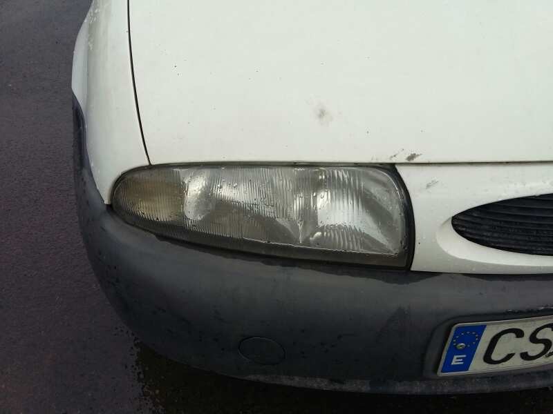 Recambio de faro derecho para ford fiesta berlina studio referencia OEM IAM 1305219059  