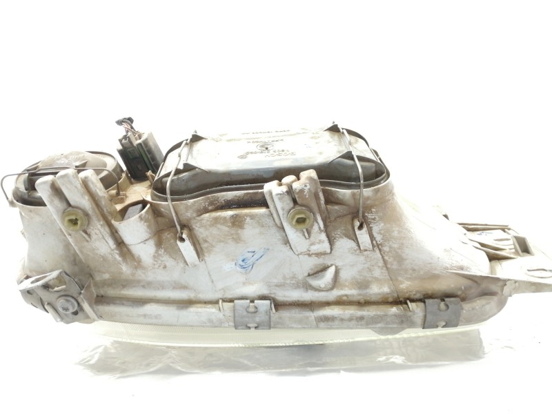 Recambio de faro derecho para ford fiesta courier familiar referencia OEM IAM 1305235251  