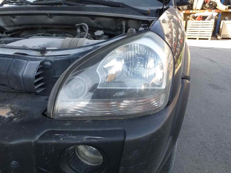 Recambio de faro izquierdo para hyundai tucson (jm) 2.0 comfort referencia OEM IAM 921012EXXX  