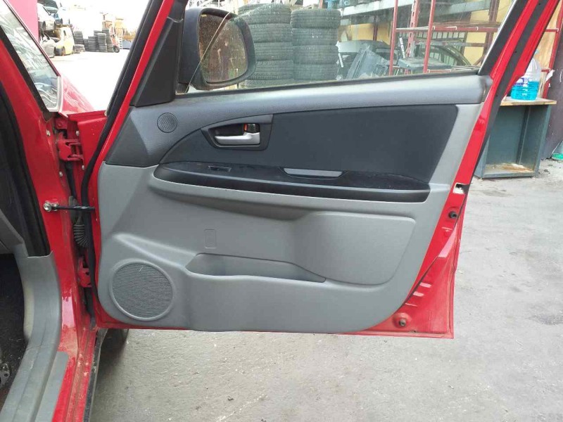 Recambio de guarnecido puerta delantera izquierda para suzuki sx4 rw (ey) glx referencia OEM IAM 8372379J00  