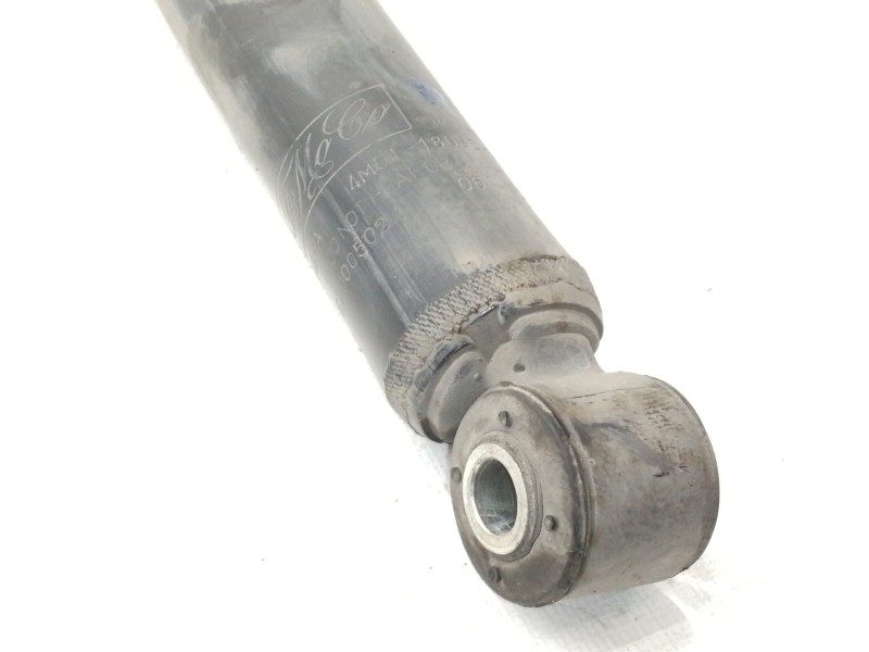 Recambio de amortiguador trasero izquierdo para ford focus berlina (cap) ghia referencia OEM IAM 4M5118080AAE  