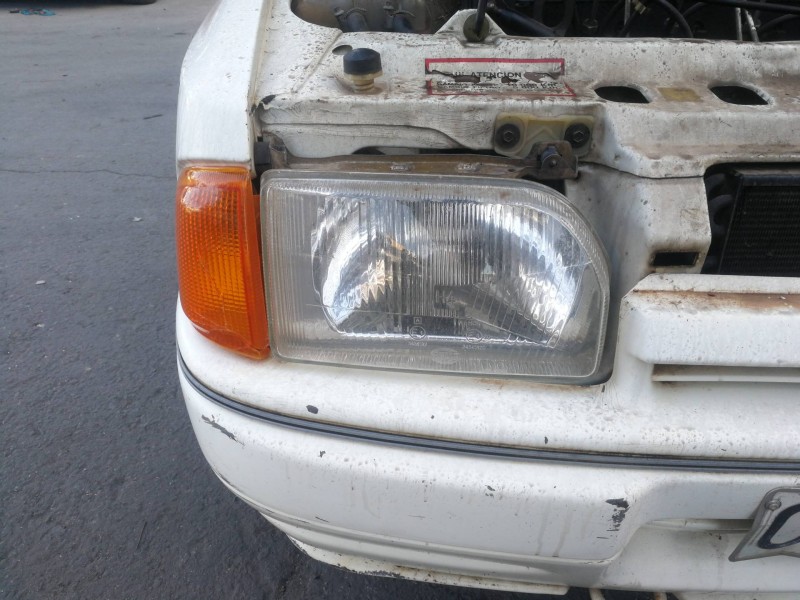 Recambio de faro derecho para ford escort berlina ghia referencia OEM IAM 34541R7  
