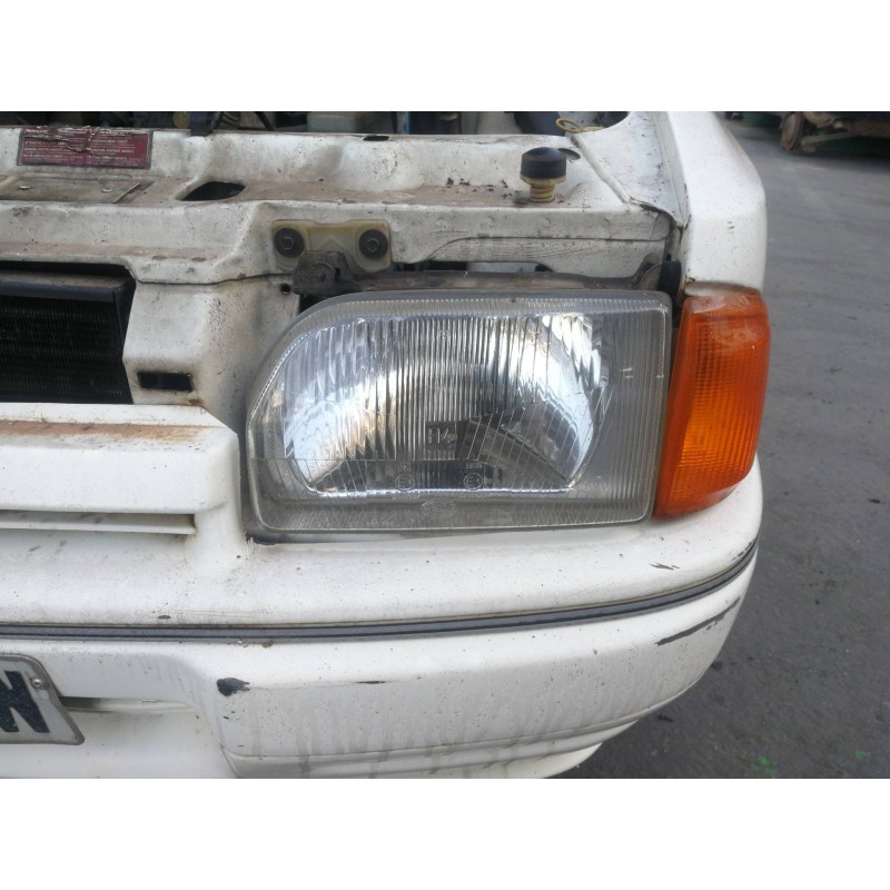 Recambio de faro izquierdo para ford escort berlina ghia referencia OEM IAM 34540R7  