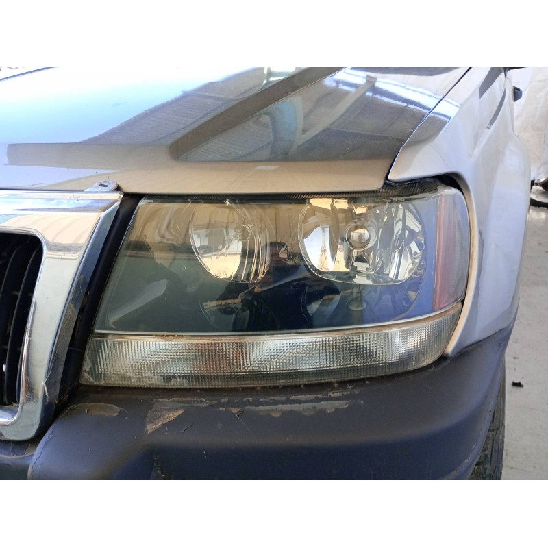 Recambio de faro izquierdo para chrysler jeep gr.cherokee (wj/wg) 3.1 td laredo referencia OEM IAM   