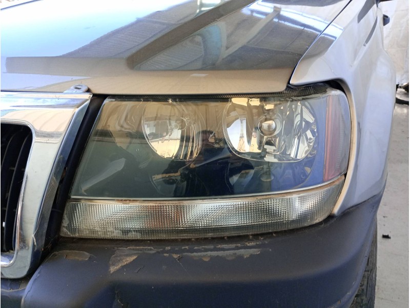 Recambio de faro izquierdo para chrysler jeep gr.cherokee (wj/wg) 3.1 td laredo referencia OEM IAM   