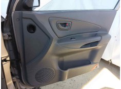 Recambio de guarnecido puerta delantera derecha para hyundai tucson (jm) 2.0 crdi cat referencia OEM IAM  823022E110LM  2