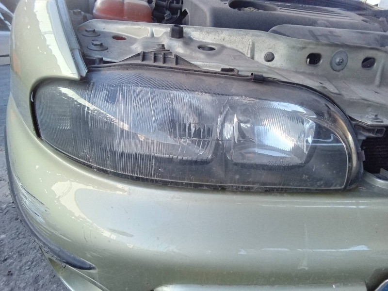 Recambio de faro derecho para fiat brava (182) jtd 105 / 100 sx referencia OEM IAM 88201558DX  