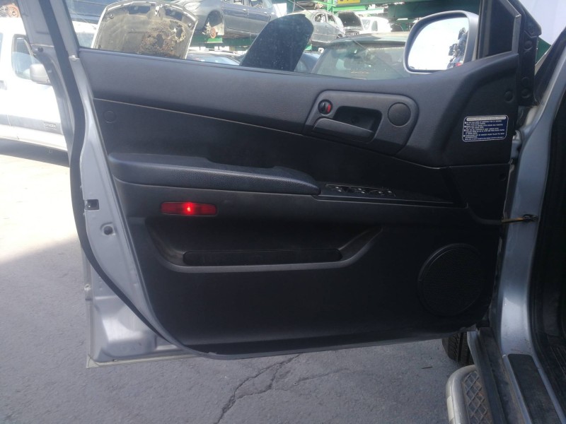 Recambio de guarnecido puerta delantera izquierda para ssangyong actyon 200 xdi referencia OEM IAM 7221809000  