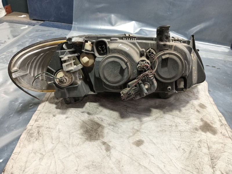 Recambio de faro izquierdo para nissan almera ii hatchback (n16) 2.2 di referencia OEM IAM 0  