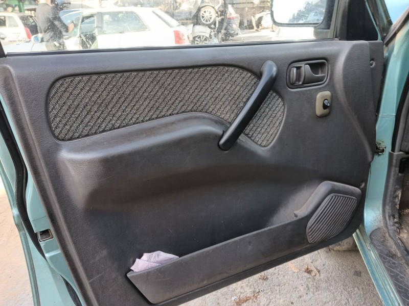 Recambio de guarnecido puerta delantera izquierda para nissan terrano ii (r20) 2.7 td 4wd referencia OEM IAM   